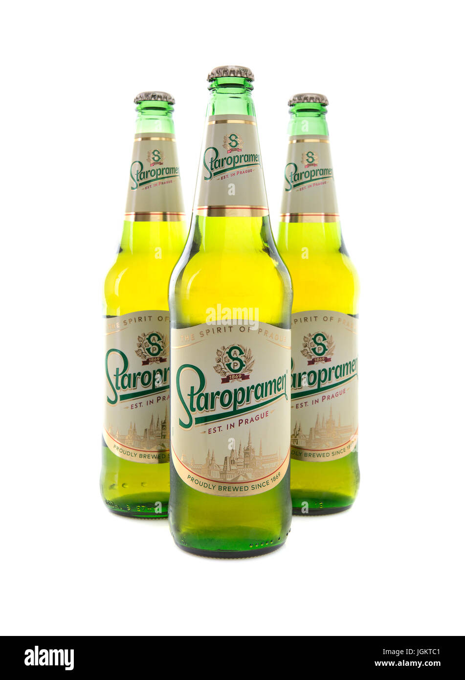 SWINDON, UK - JULY 8, 2017: Three Bottles of Staropramen Czech Beer, brewed in Prague on a white background Stock Photo