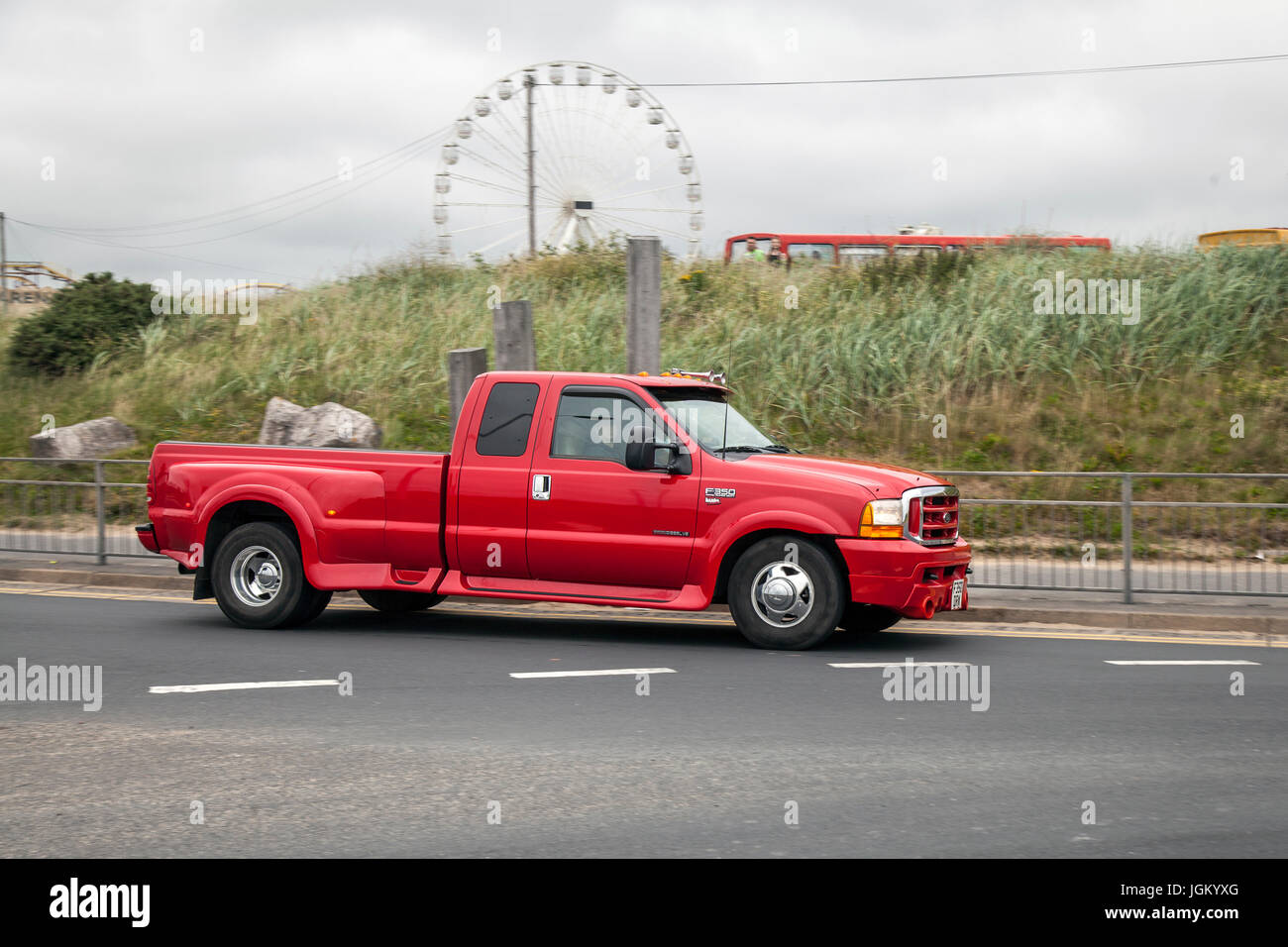 Red Dodge Ram SUV double cab pick-up.   Souped-up supercars from across the North West once again descend on Southport for a high-octane meet-up. Stock Photo