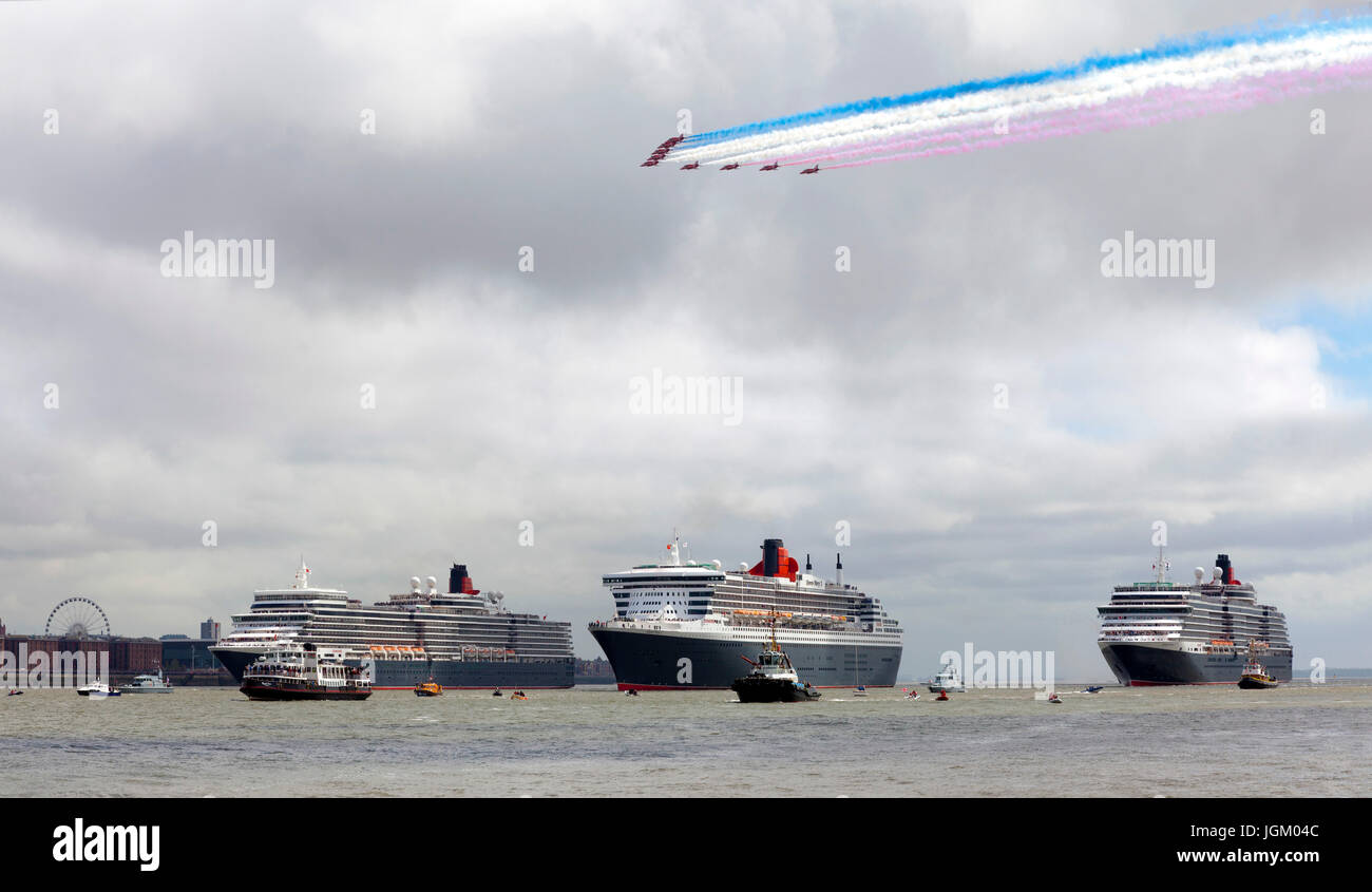 Panorama of Queen Elizabeth, Queen Mary 2 and Queen Victoria liners in River Mersey to celebrate Cunard's 175th anniversary. Stock Photo