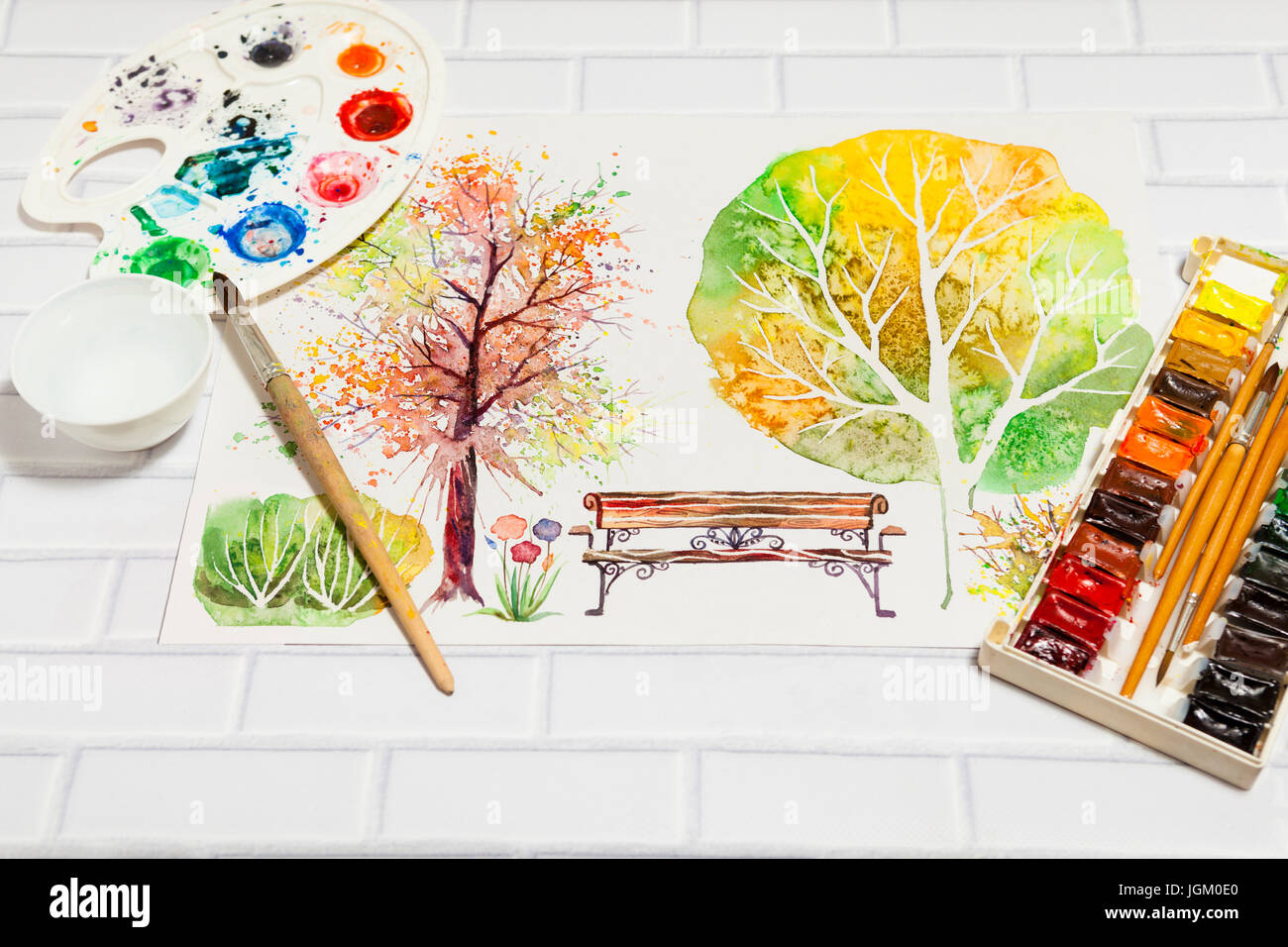 Hand Drawn Bright Sketch with autumn park with trees, bench, bush and lying flat paints, paintbrushes and palette on the white brick background - conc Stock Photo