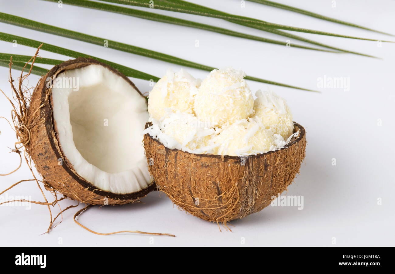 Coconut ice cream in a coco shell on white Stock Photo Alamy