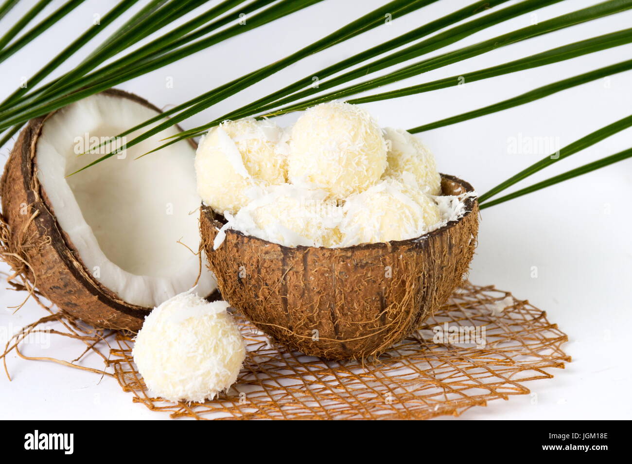 Coconut ice cream in a coco shell on white Stock Photo - Alamy