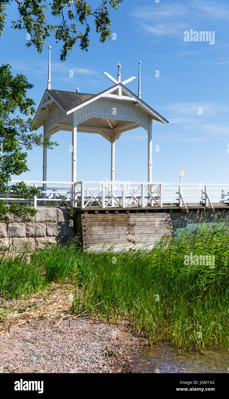 White wood made sun shade above pedestrian road in summer Stock Photo