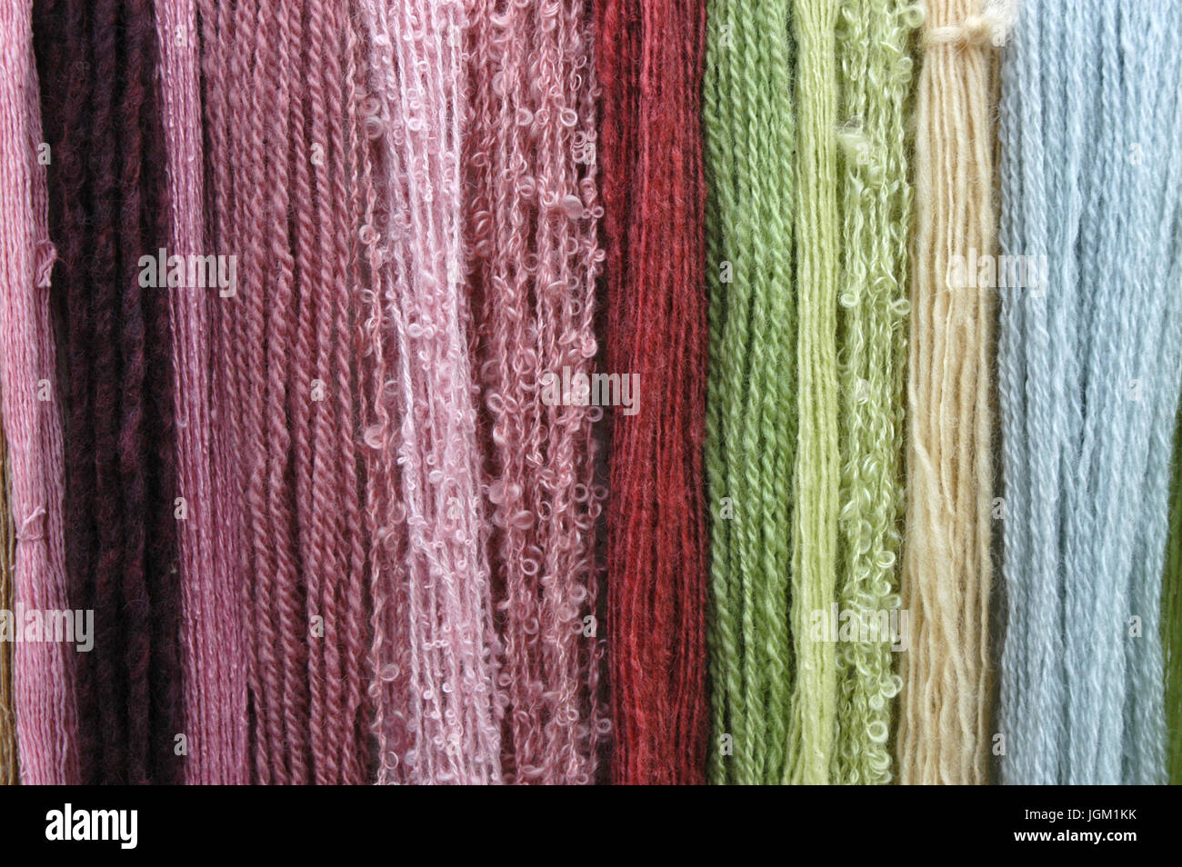 Coloured Strands of different types of wool Stock Photo - Alamy