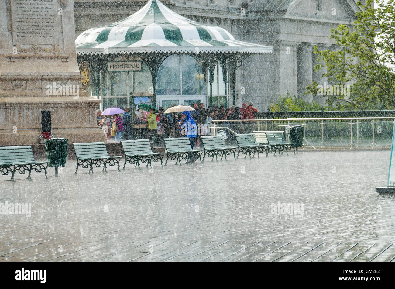 Quebec City, Canada July 27, 2014 Crowd of people walking in heavy