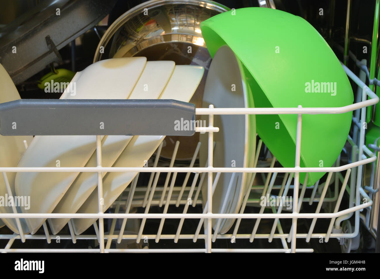 Dishware clean after washing in the dishwasher Stock Photo Alamy