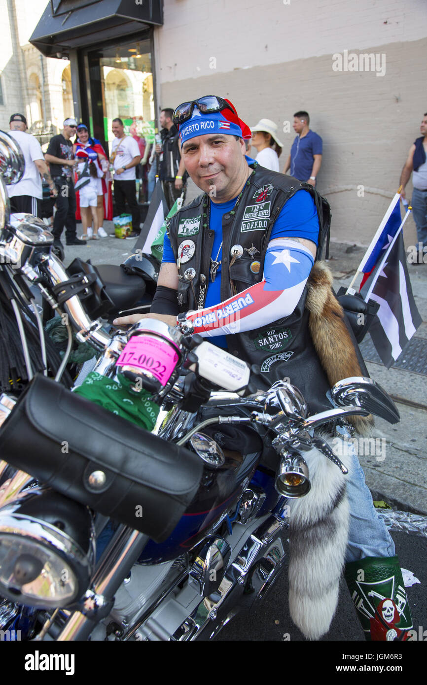 Local Puerto Rican Day Parade in the Sunset Park neighborhood of Brooklyn, New York. Members of the 'Dirty Ones' Motorcycle Club ready to ride in the parade. Stock Photo