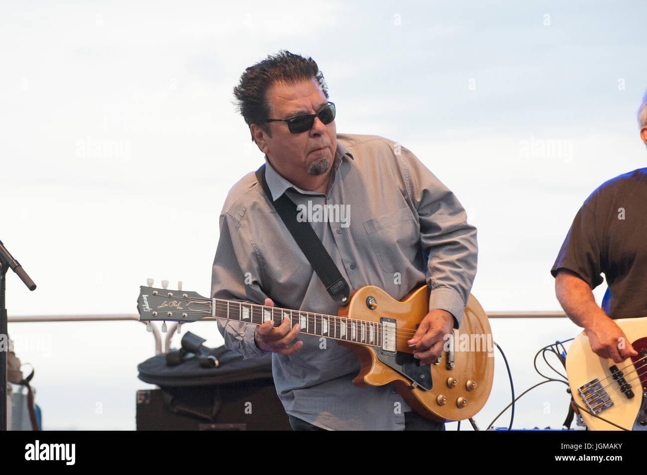Cesar Rosas, a founder of Los Lobos, the rock band from East Los Angeles, playing at the annual River and Blues festival in Battery Park City. July 6, Stock Photo