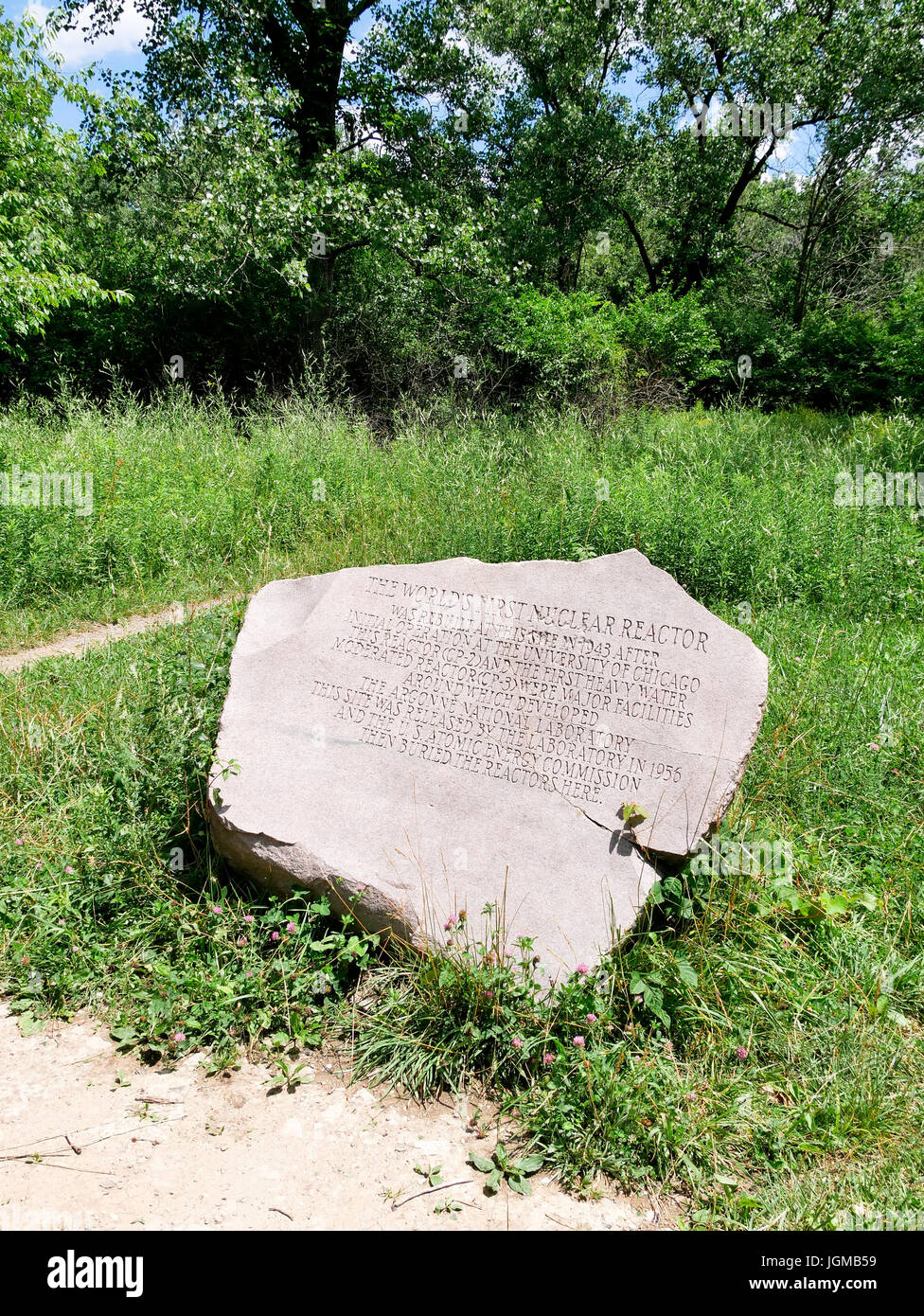 Commemorative boulder at Site A, former Manhatten Project research facility. Red Gate Woods, Palos Township, Illinois USA Stock Photo