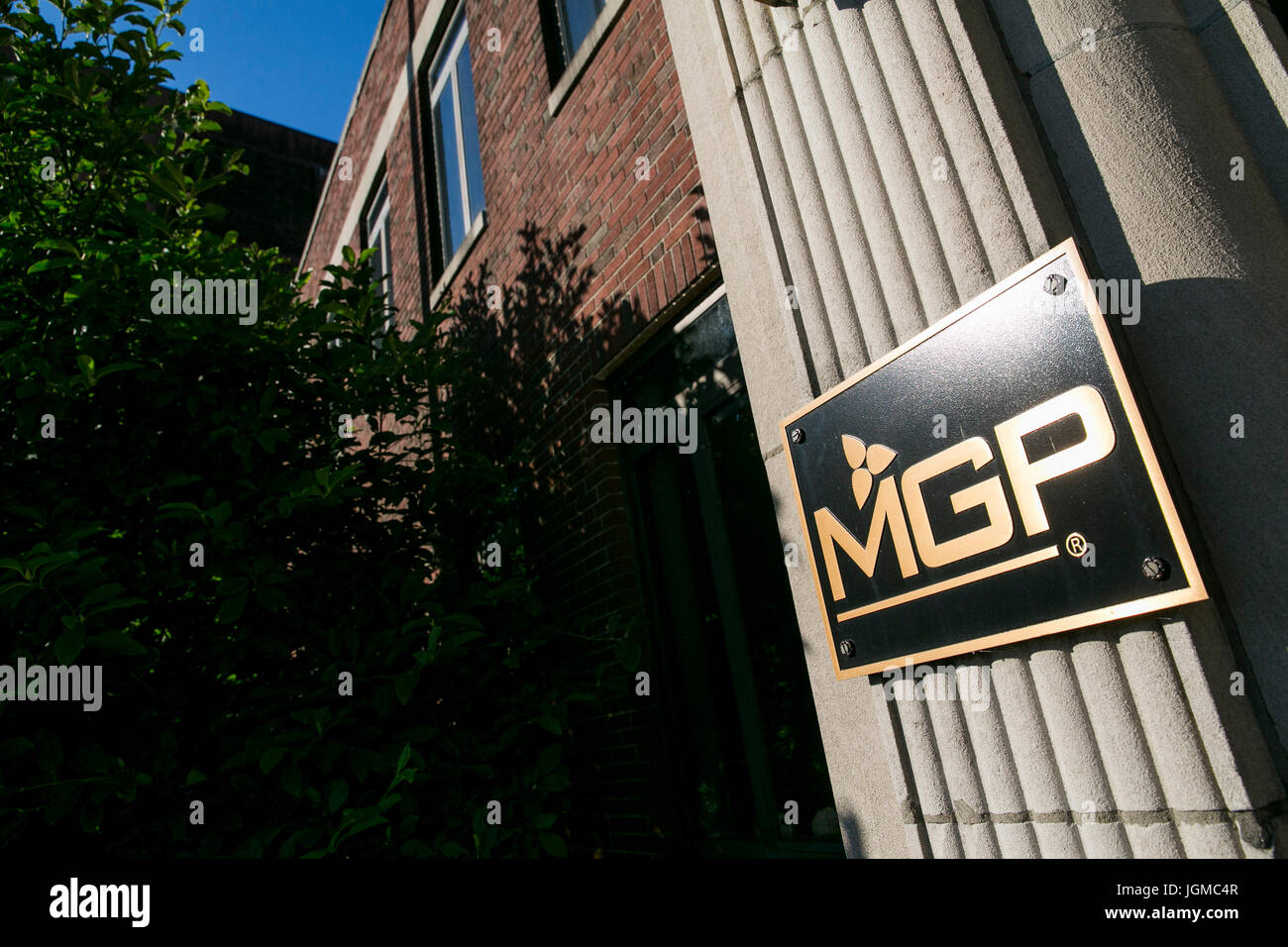 A logo sign outside of a facility occupied by MGP Ingredients, Inc., also known as Midwest Grain Products, in Lawrenceburg, Indiana on July 2, 2017. Stock Photo