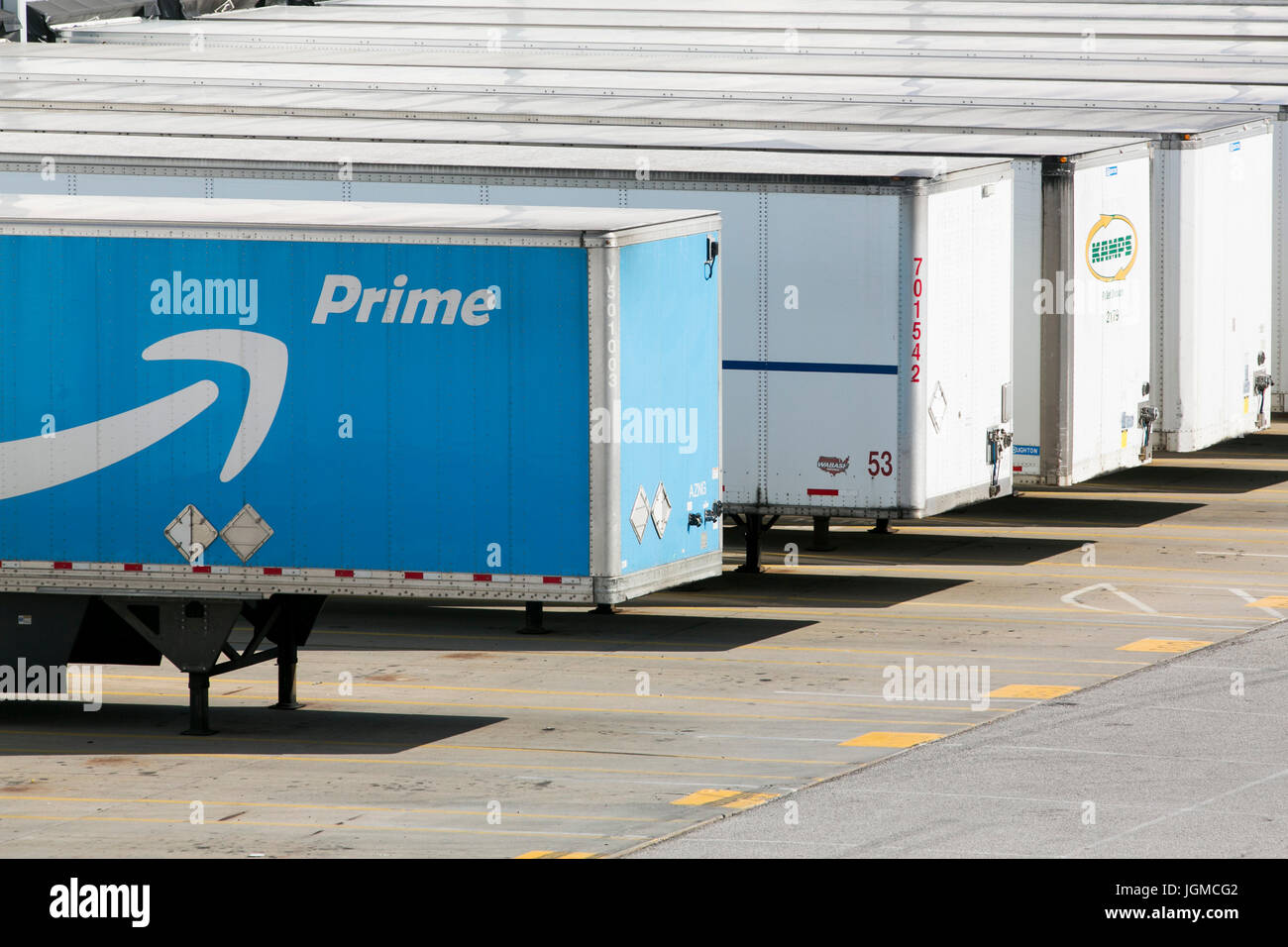 An Amazon Prime logo seen on semi truck trailers outside of a Amazon Fulfillment Center in Hebron, Kentucky on July 2, 2017. Stock Photo