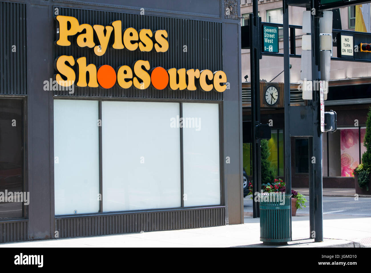 A logo sign outside of a shuttered Payless ShoeSource Inc., retail store in Cincinnati, Ohio on June 29, 2017. Stock Photo