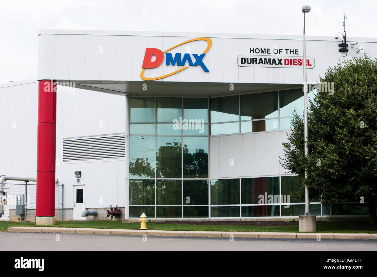 A logo sign outside of the headquarters of the Dmax engine factory in
