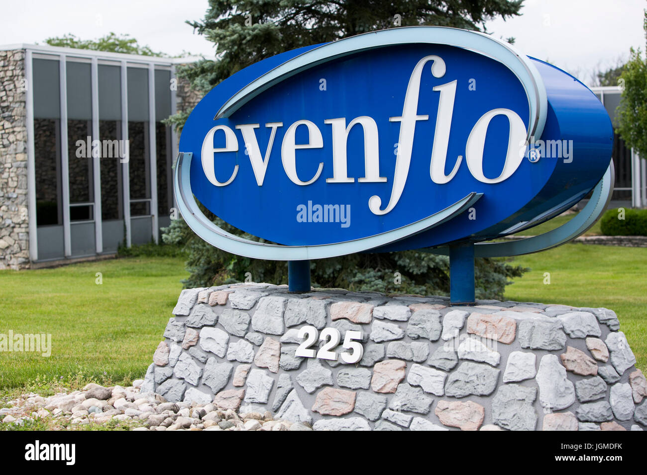 A logo sign outside of the headquarters of the Evenflo Company, Inc