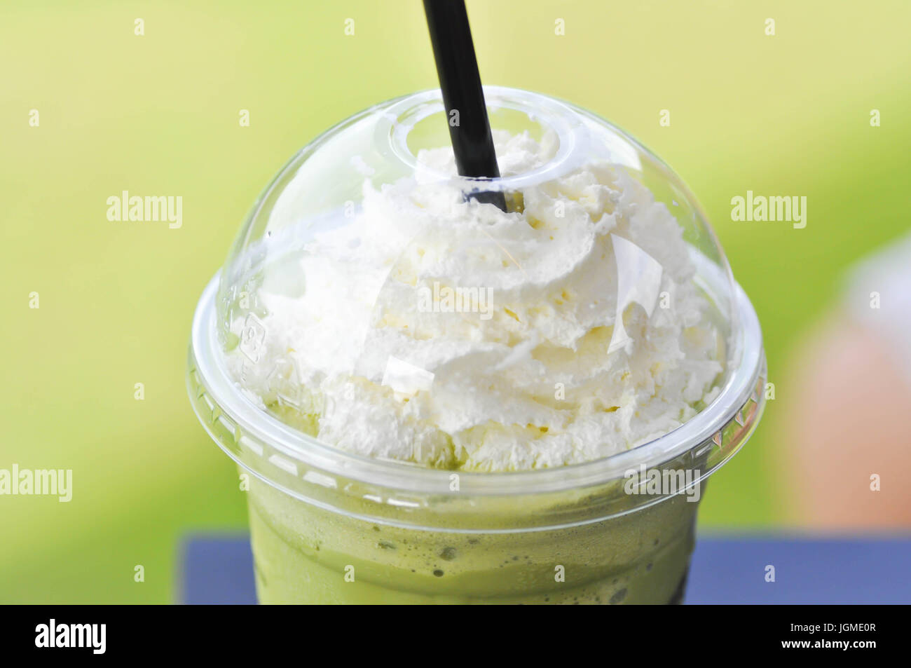green tea frappe with whipped cream topping or green tea frappuccino