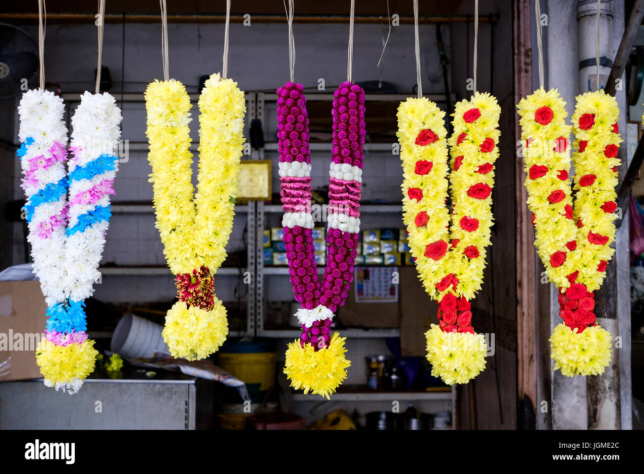 Flower garlands for sale as offerings on a street stall just off Little India, Jalan Masjid Kapitan Keling, George Town, Pulau Pinang, Malaysia. Stock Photo
