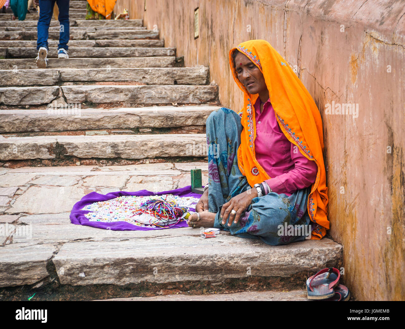 Jaipur, India - Jul 28, 2015. An India woman selling souvenir at street market in Jaipur, India. Jaipur is the capital and largest city of the Indian  Stock Photo