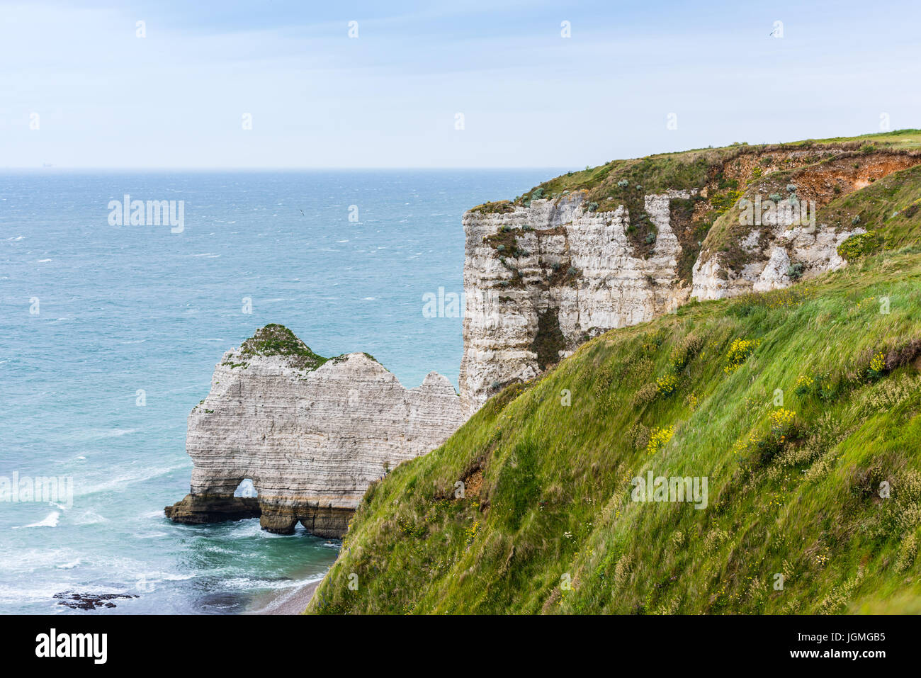 The beach and stone cliffs in Etretat, France, Normandy Stock Photo - Alamy