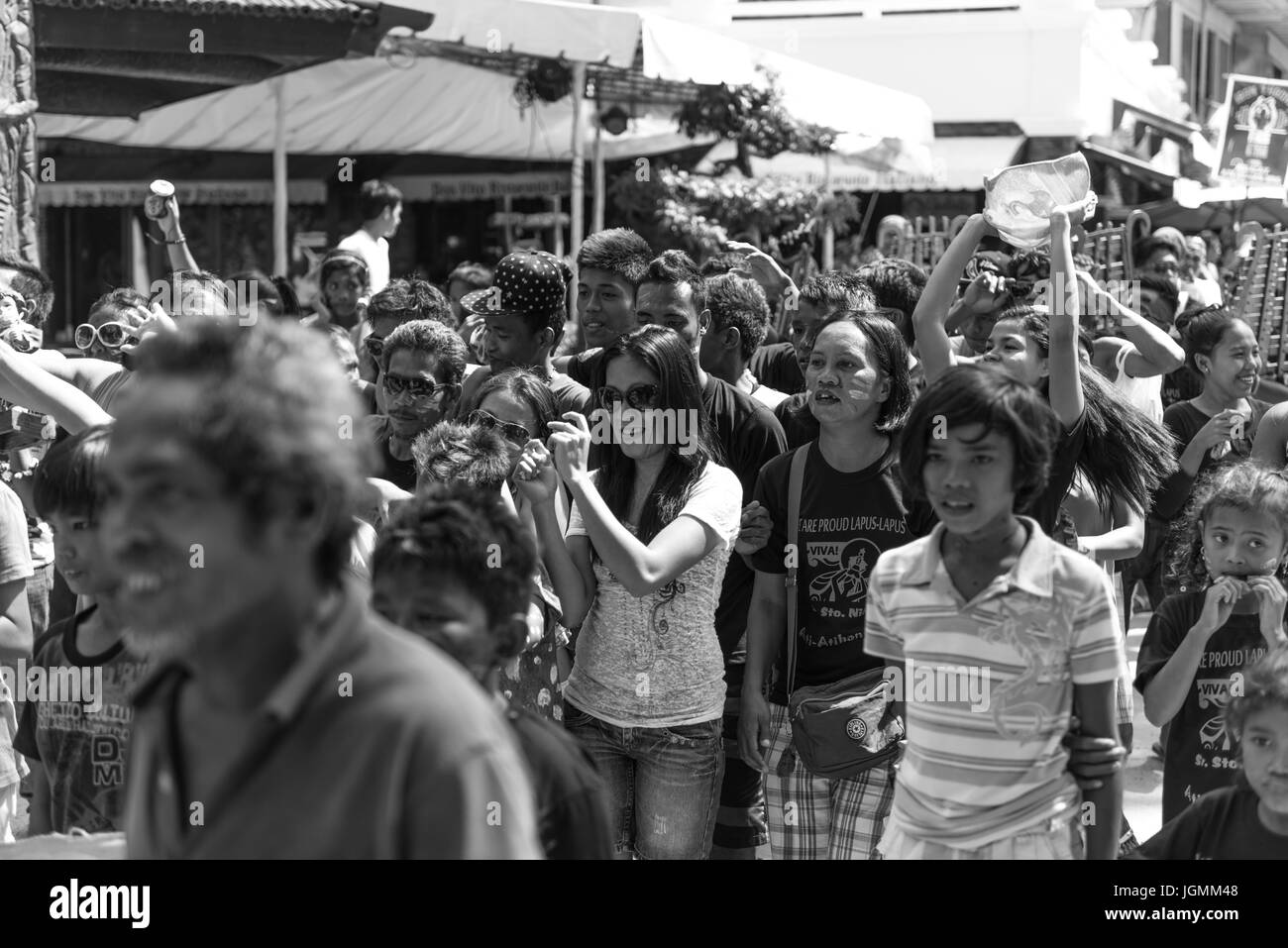 Black and white picture of crowds of natives filipinos of Boracay celebrating Ati-Atihan Festival. Stock Photo