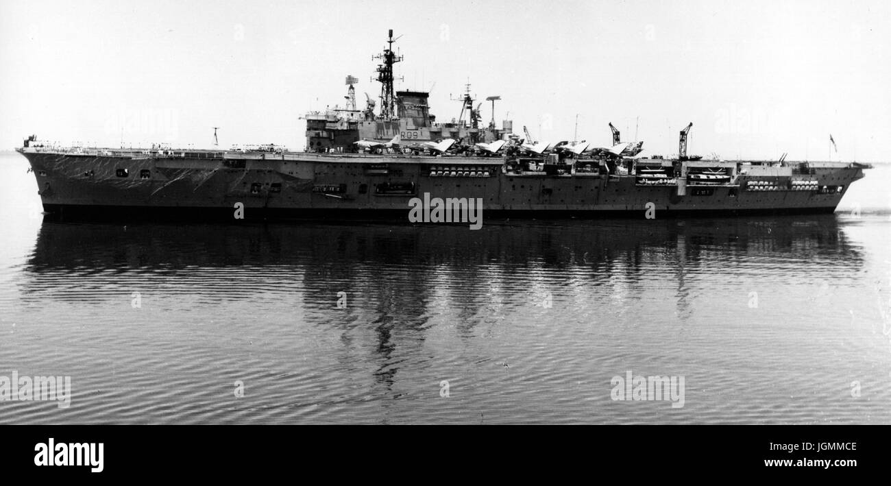 AJAXNETPHOTO. 1965. GREAT BITTER LAKE, EGYPT - ARK EAST OF SUEZ - HMS ARK ROYAL PASSING THROUGH THE GREAT BITTER LAKE OF THE SUEZ CANAL ON PASSAGE TO THE FAR EAST.  PHOTO:JONATHAN EASTLAND/AJAX REF:SUEZ 65 Stock Photo