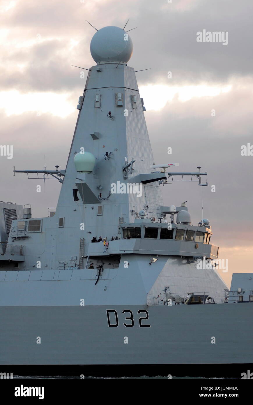 AJAXNETPHOTO. 5TH DECEMBER, 2014. PORTSMOUTH, ENGLAND. - DESTROYER ARRIVES - HMS DARING (TYPE 45) ENTERING HARBOUR AT SUNSET. PHOTO:TONY HOLLAND/AJAX REF:DTH140712 1744 Stock Photo