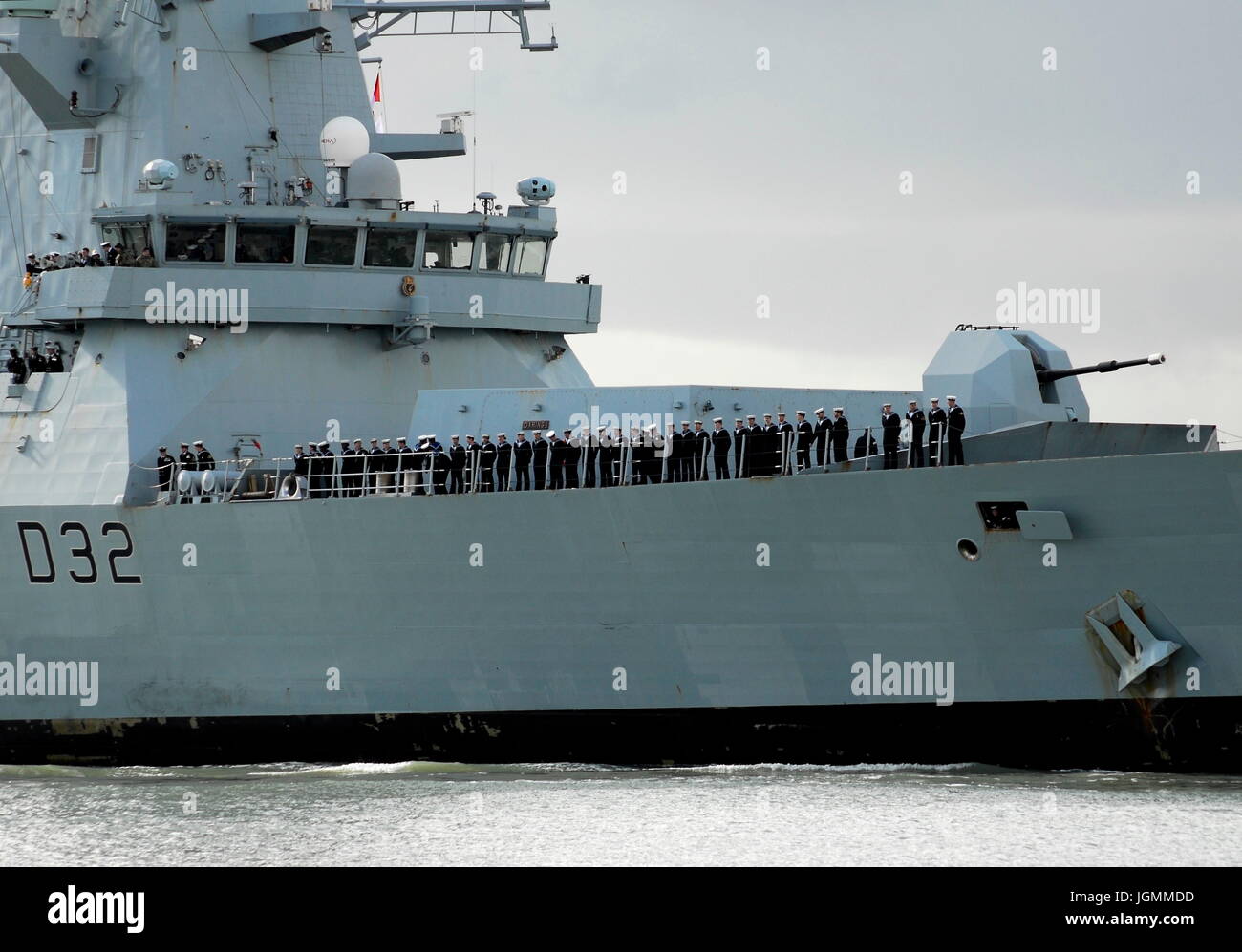 AJAXNETPHOTO. 28TH FEBRUARY, 2014. PORTSMOUTH, ENGLAND. - DESTROYER RETURNS - TYPE 45 HMS DARING ENTERING THE NAVAL BASE TODAY. PHOTO:TONY HOLLAND/AJAX REF:DTH142802 7275 Stock Photo