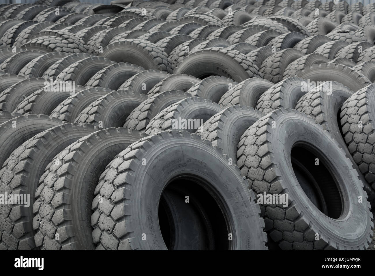 Warehouse of old used tires outdoors, old wheels Stock Photo - Alamy