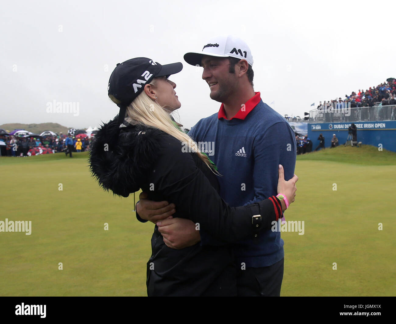 Spain's Jon Rahm celebrates winning the Dubai Duty Free Irish Open with girlfriend Kelley Cahill at Portstewart Golf Club. Stock Photo