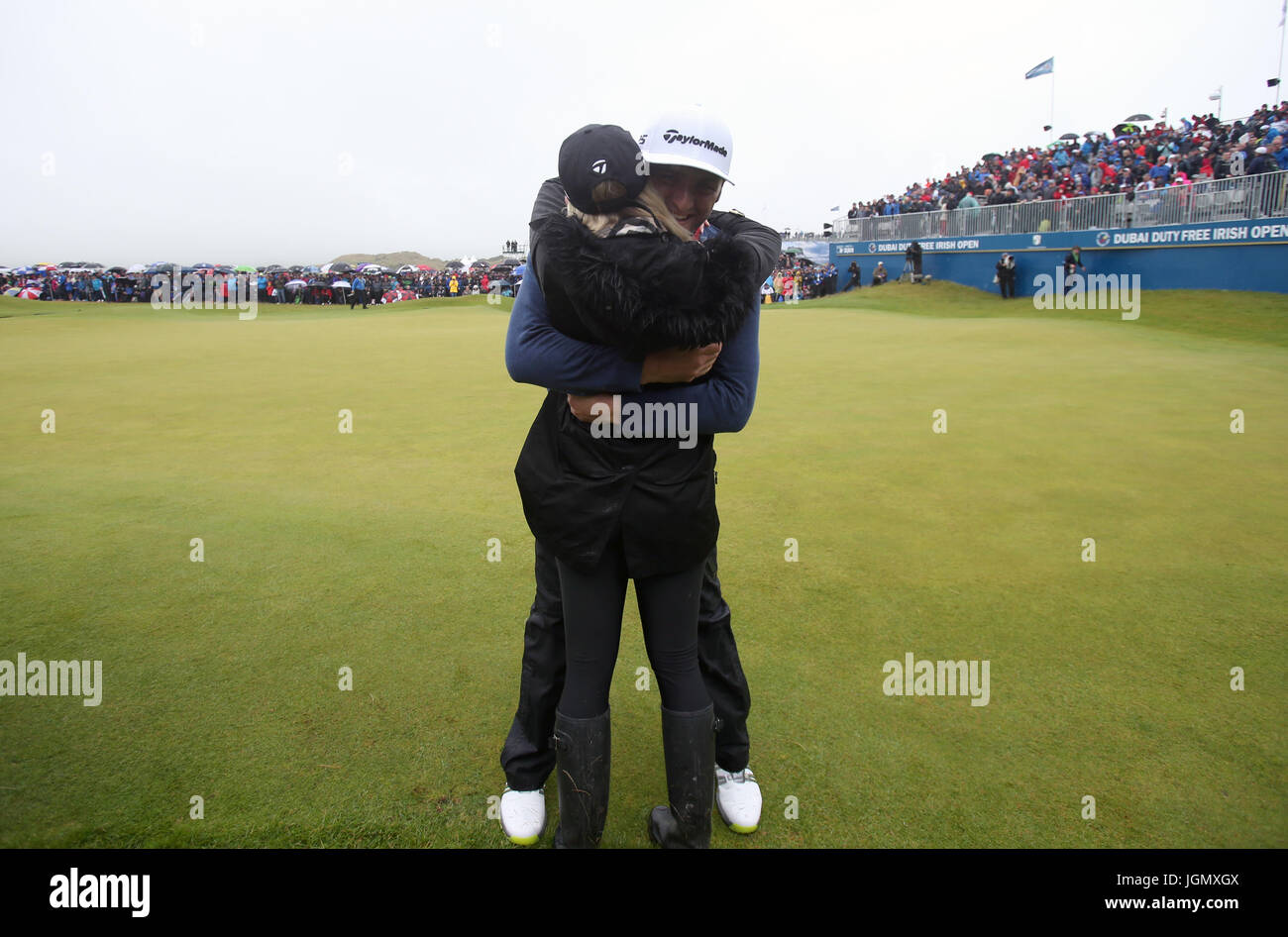 Spain's Jon Rahm celebrates winning the Dubai Duty Free Irish Open with girlfriend Kelley Cahill at Portstewart Golf Club. Stock Photo