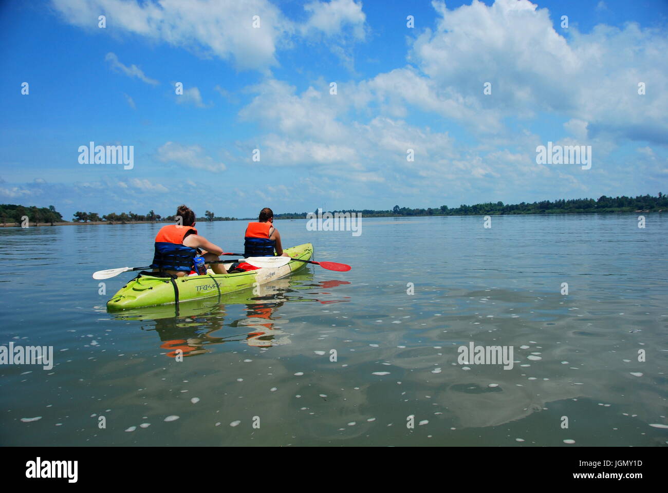 Kayaking on the Mekong River looking for pink dolphins near Don Det, 4000 Islands, Laos Stock Photo