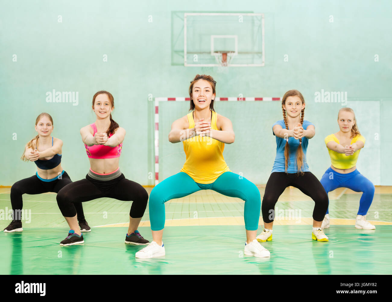 Squats girls hi-res stock photography and images - Alamy
