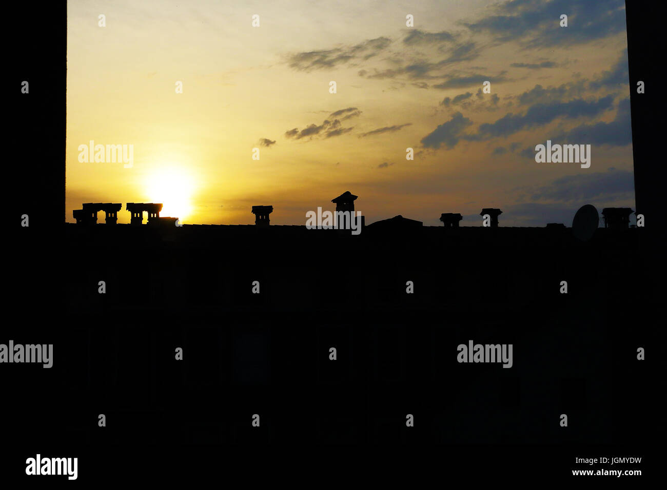 tramonto tetti città Stock Photo