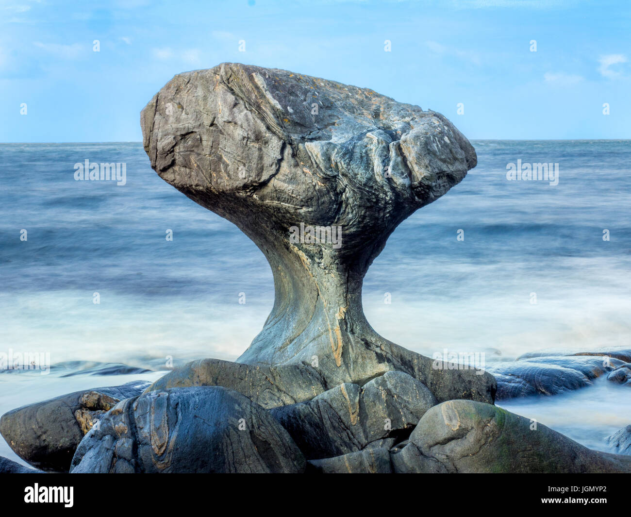 'Kannestein' rock, a Norwegian landmark shaped by the sea over thousands of years Stock Photo