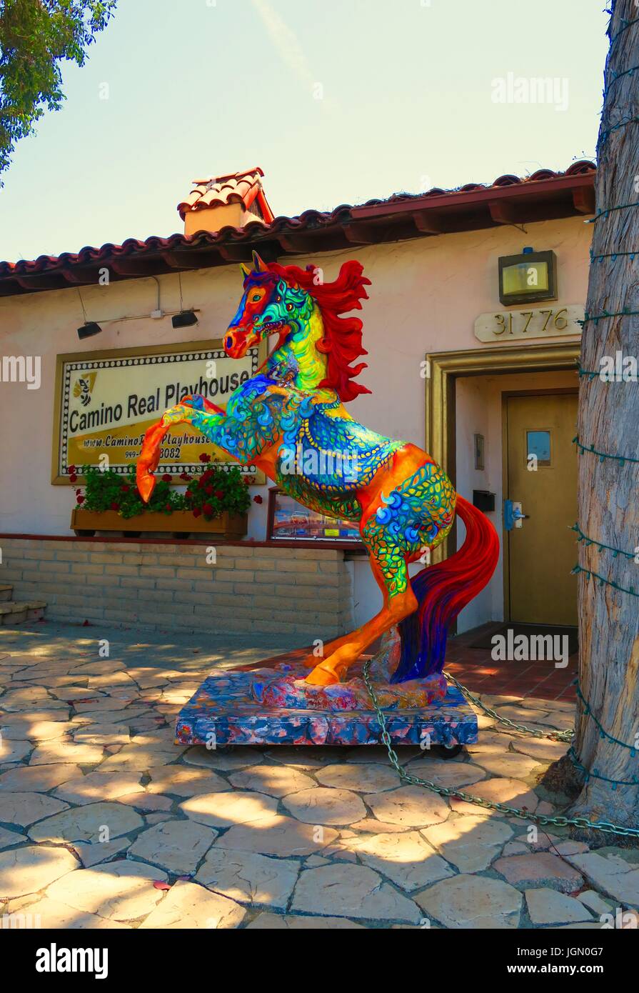 fiery rainbow painted horse, Camino Real Playhouse, San Juan Capistrano, CA Stock Photo