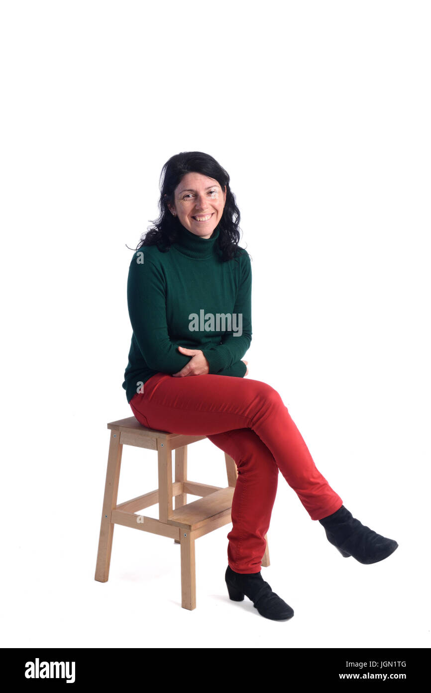 Portrait of a woman sitting with white background Stock Photo - Alamy