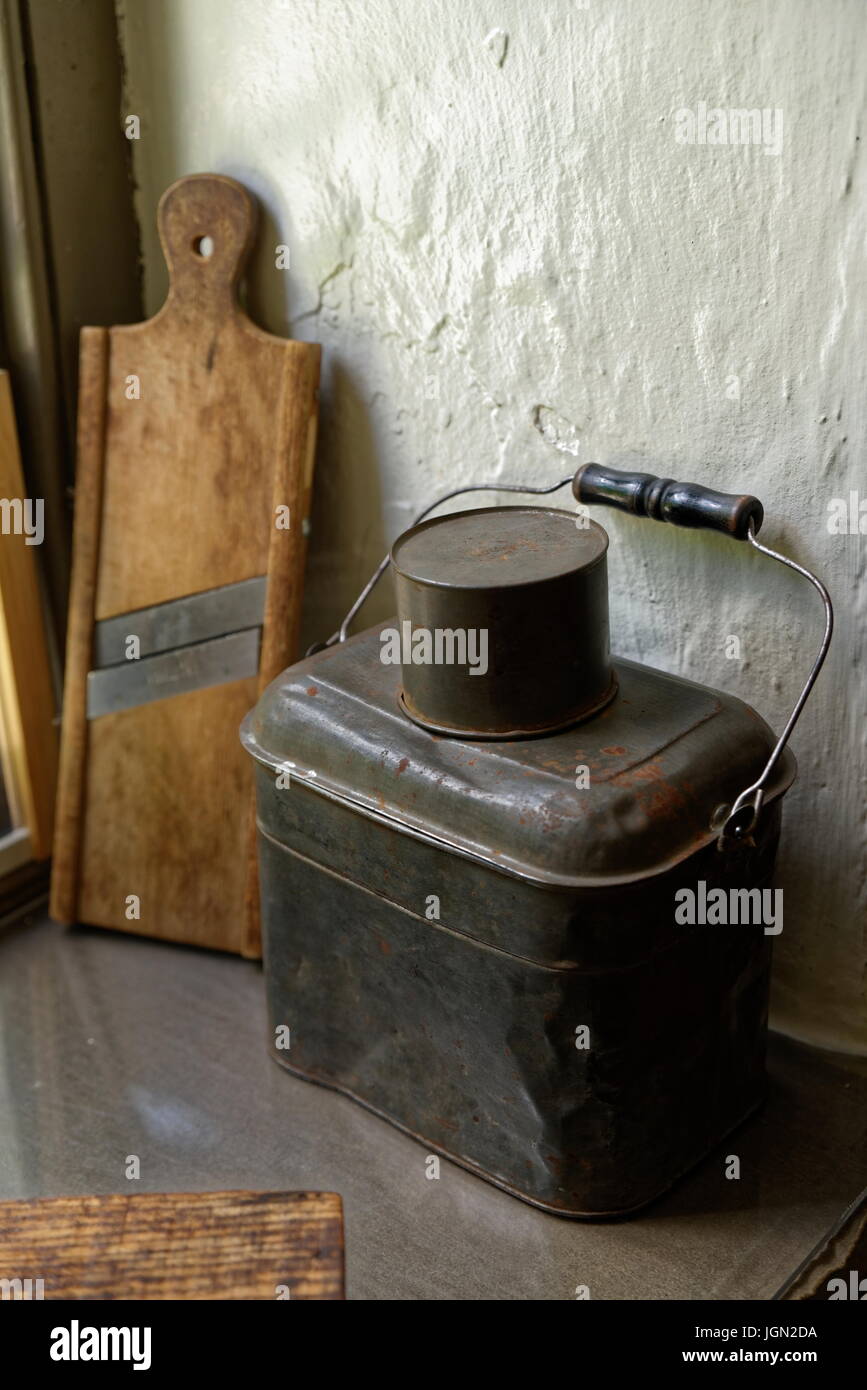 Antique lunch pail and kitchen slicer Stock Photo Alamy