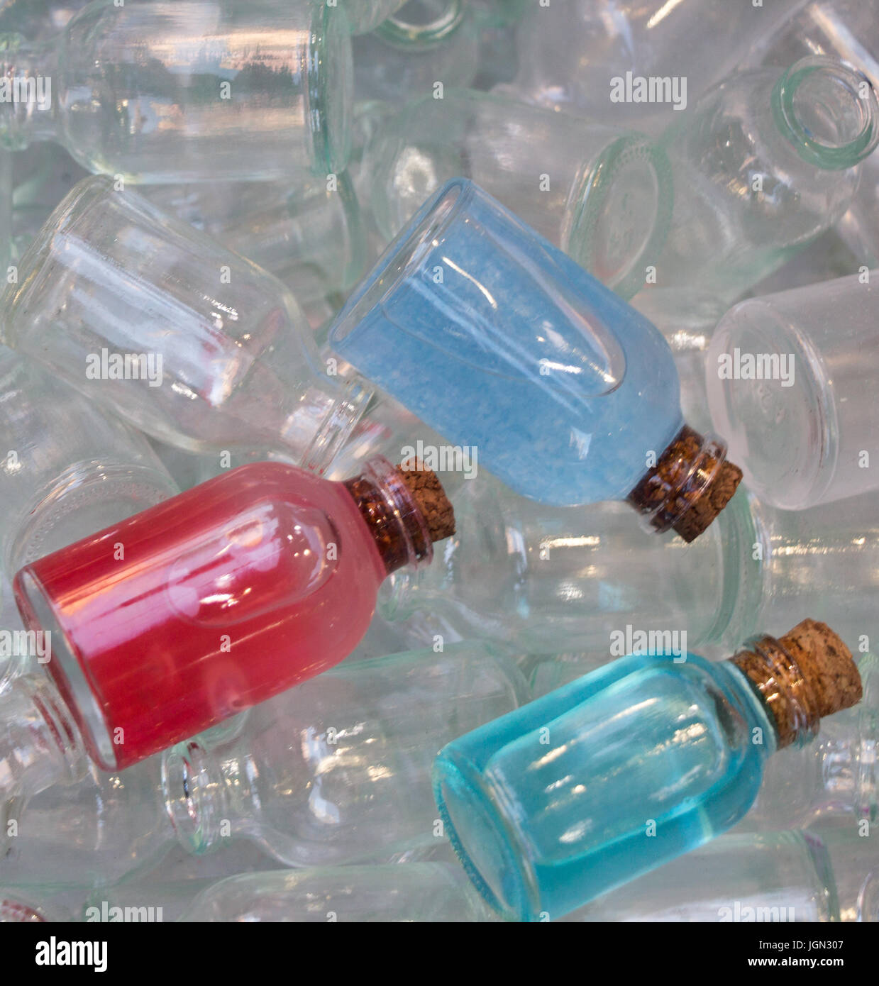 Set of Empty small transparent bottles in a box Stock Photo - Alamy