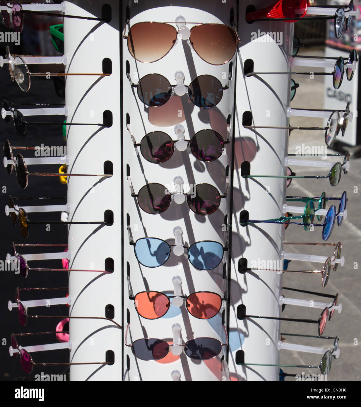 Different Color Spectacle set of different colored glasses as a background Stock Photo - Alamy