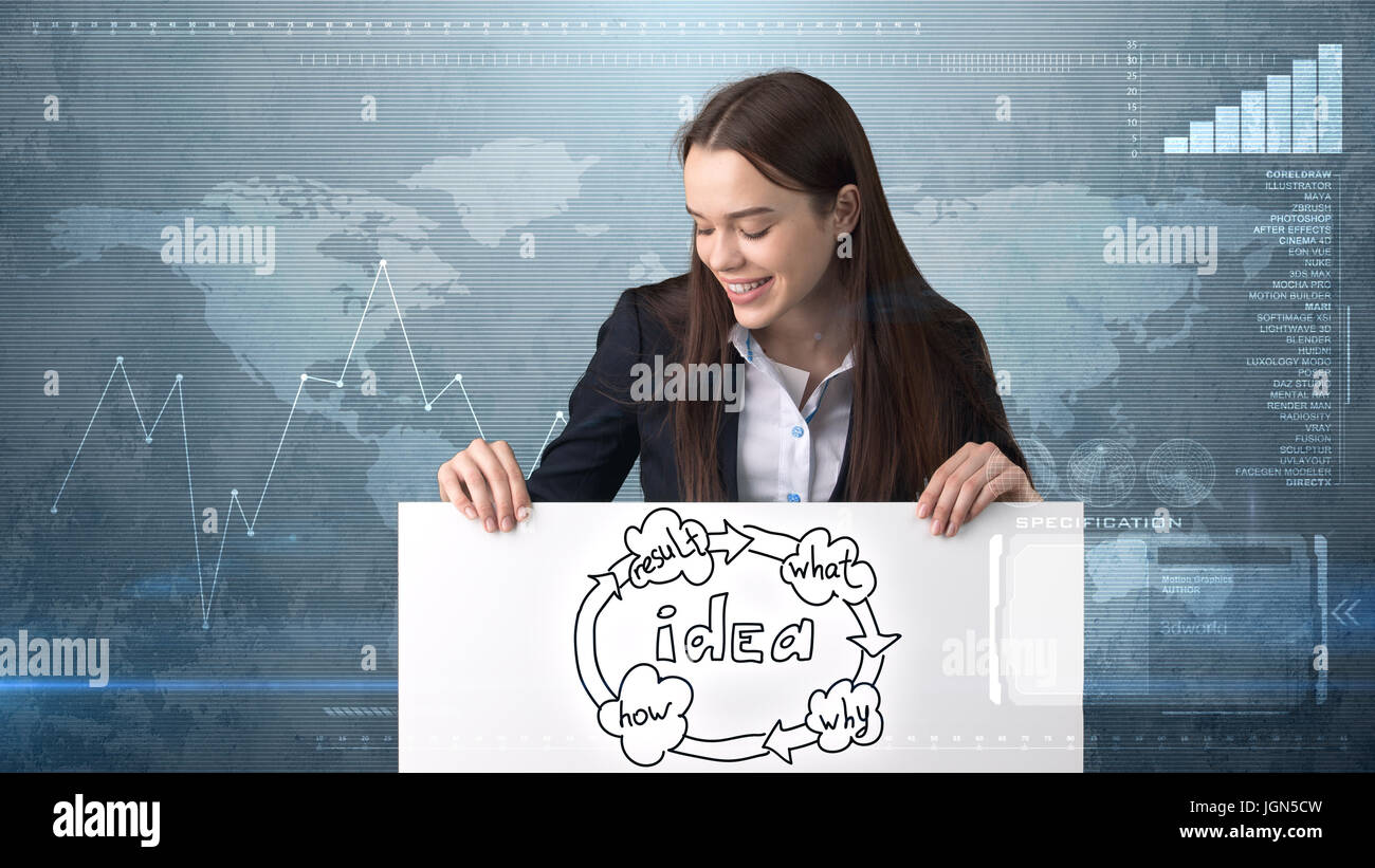 Creative ideas concept, businesswoman standing on studio painted background holding paper with organizational chart. Stock Photo