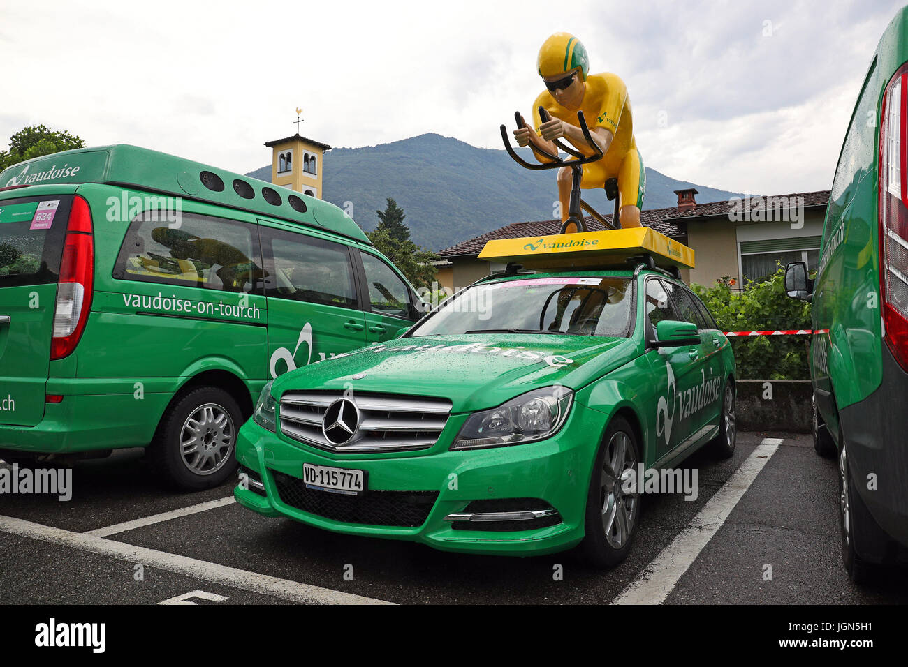 Ascona, Ticino, Switzerland, June 14, 2017: wet Vaudoise main sponsor vehicles parked in Ascona at the end of the first leg of the 2017 Tour de Suisse Stock Photo