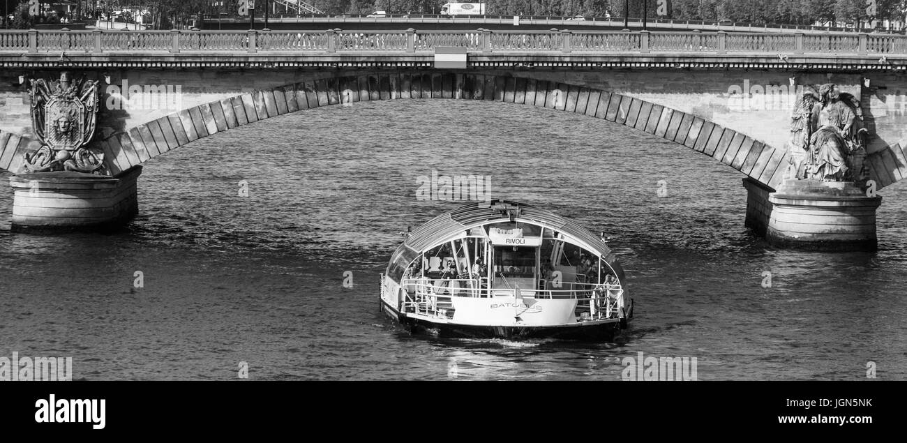 PARIS, FRANCE – 21 SEPTEMBER 2012: Pleasure boat sails on the river Seine. 21 September, 2012. Paris, France. Stock Photo