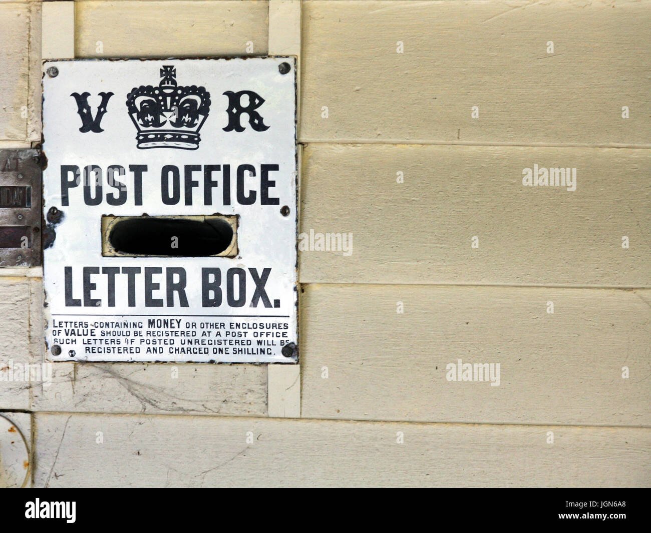 Victorian era post office letter box in Okains Bay, South Island, New Zealand Stock Photo