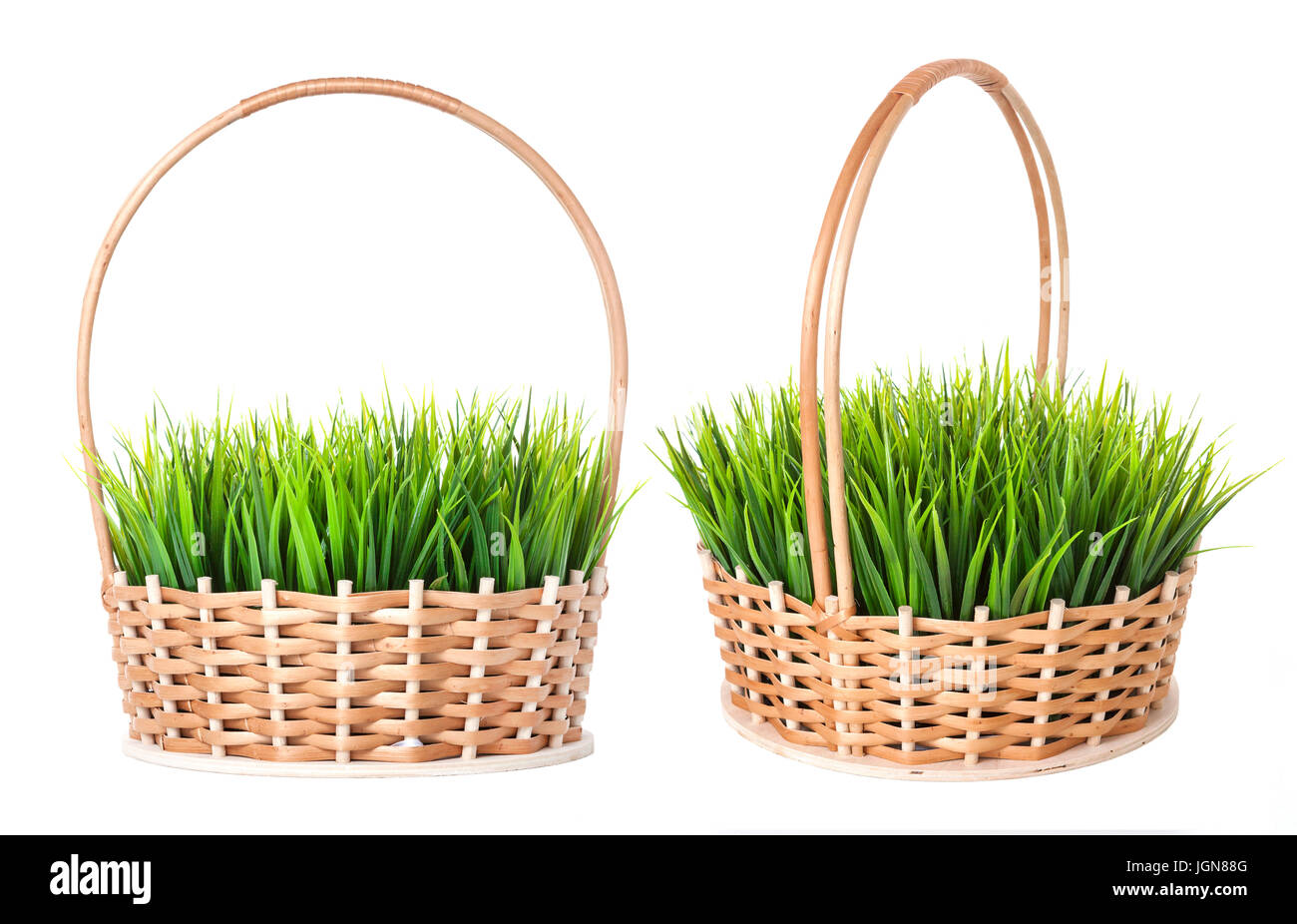 Grass in wicker basket isolated on white background Stock Photo - Alamy