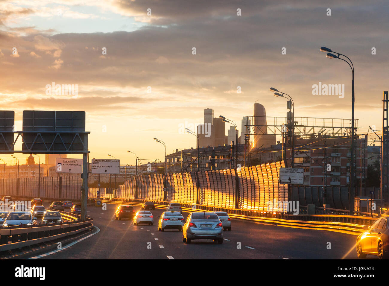 MOSCOW, RUSSIA - JULY 3, 2017: car traffic on Luzhnetskaya overpass of Third Ring Road on summer sunset. The Third Ring it is one of Moscow's main roa Stock Photo