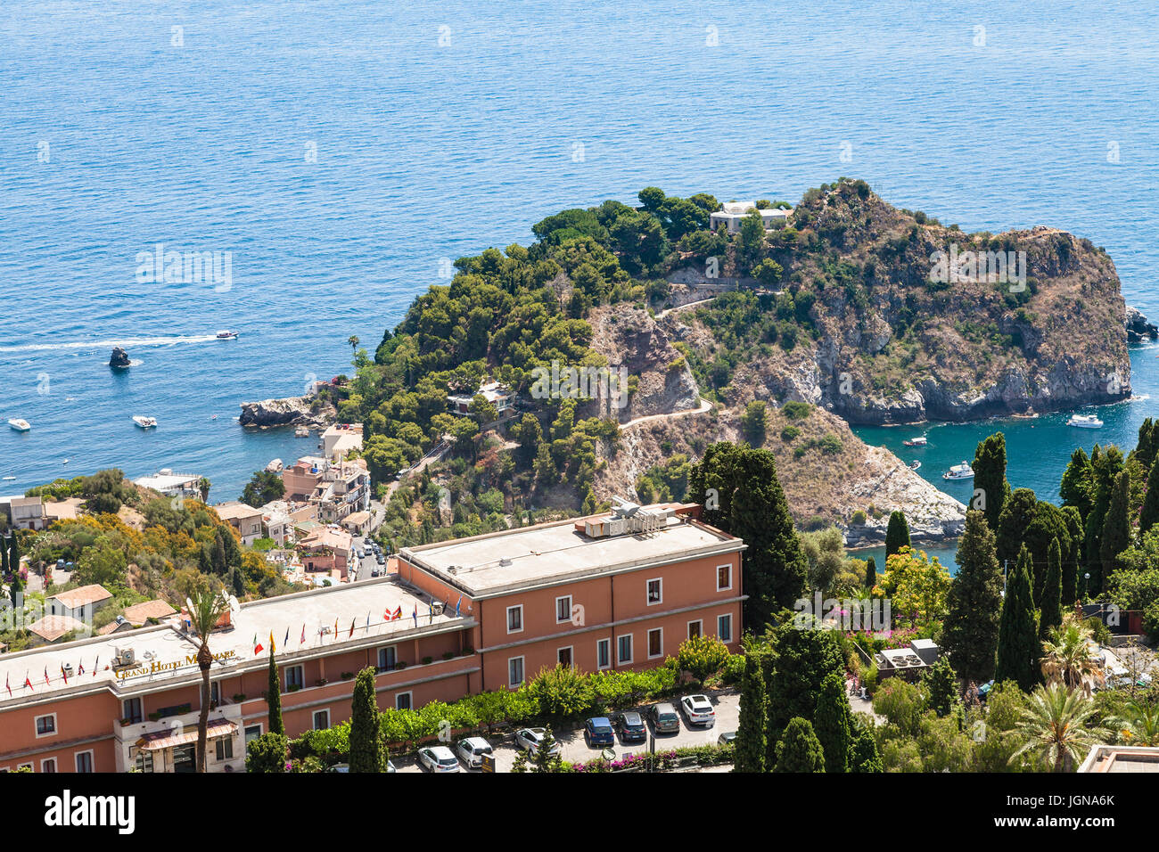 TAORMINA, ITALY - JUNE 29, 2017: above view of cape near Isola Bella island in Ionian Sea from Taormina. From 1990 there is a nature reserve, administ Stock Photo