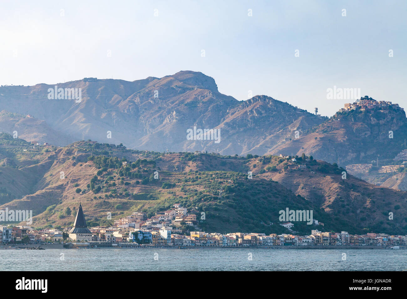 travel to Sicily, Italy - view of Giardini Naxos town in summer sunset Stock Photo