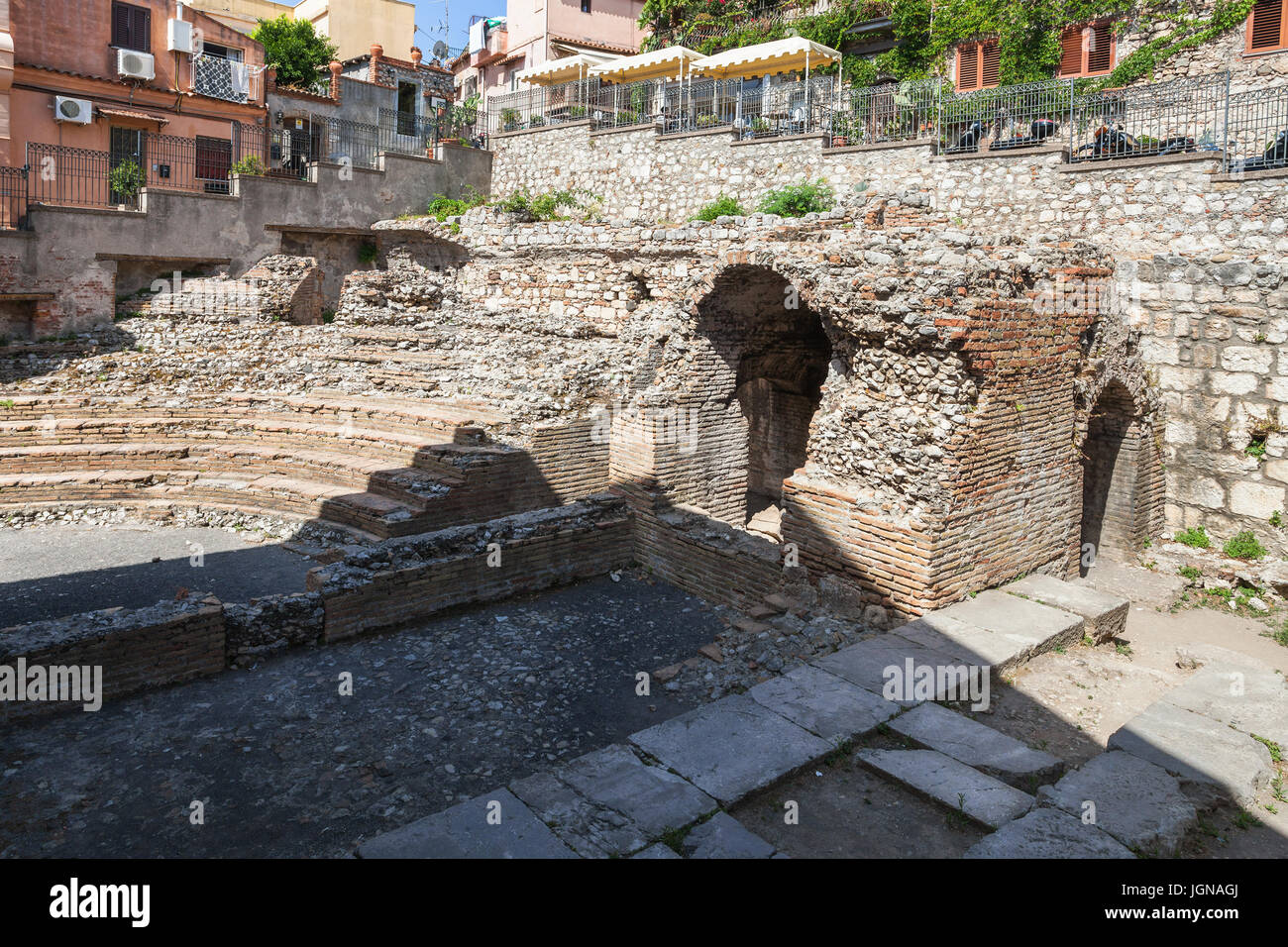 travel to Sicily, Italy - ruins of ancient roman theater Odeon in Taormina city. Stock Photo