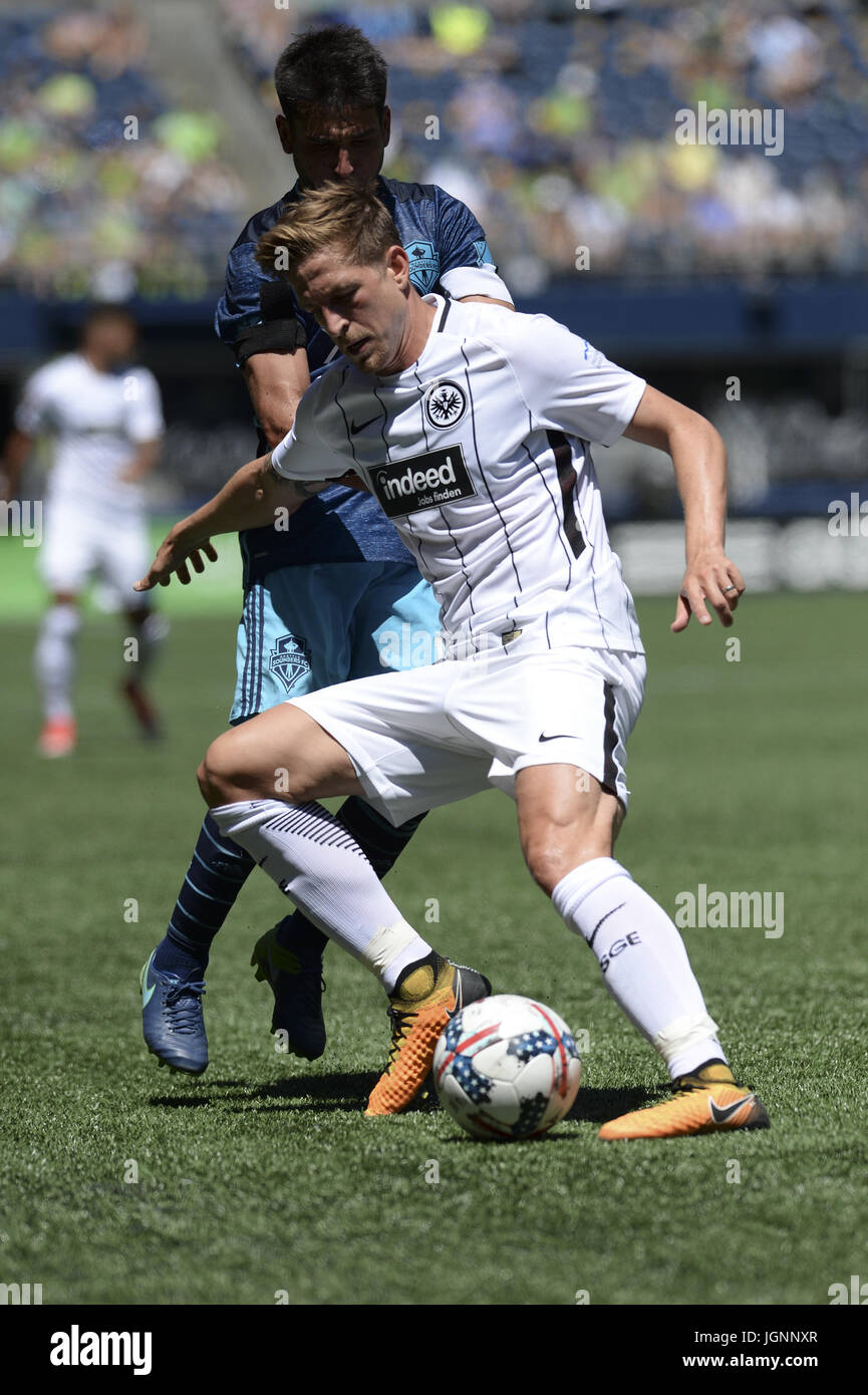 Seattle, Washington, USA. 8th July, 2017. Soccer 2017: NICOLAS LODEIRO (10) and BASTIAN OCZIPKA (6) battle for posession as Eintracht Frankfurt visits the Seattle Sounders for an International friendly match at Century Link Field in Seattle. Credit: Jeff Halstead/ZUMA Wire/Alamy Live News Stock Photo