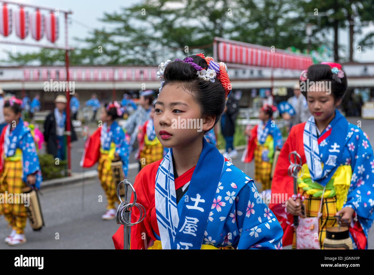 Narita, Japan. 7th July, 2017. Young girl in traditional Japanese attire waiting to accompany a float as part of clebrations of the Gion-e festival at Naritasan Shinshoji temple in Narita, Japan. Stock Photo