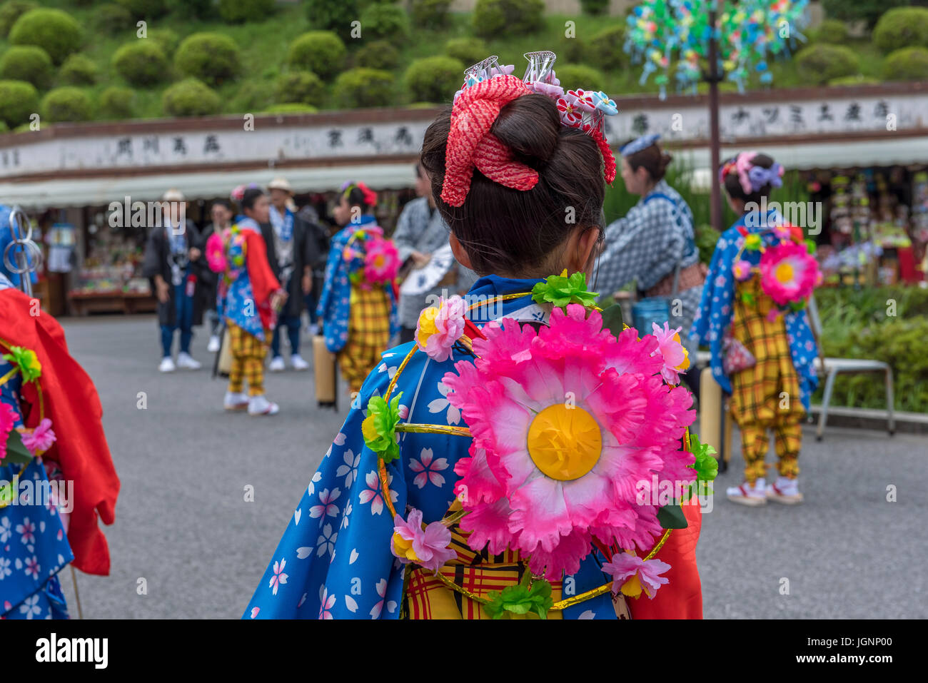 Narita, Japan. 7th July, 2017. Young girl in traditional Japanese attire waiting to accompany a float as part of clebrations of the Gion-e festival at Naritasan Shinshoji temple in Narita, Japan. Stock Photo